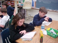 Fourth graders reading AR books